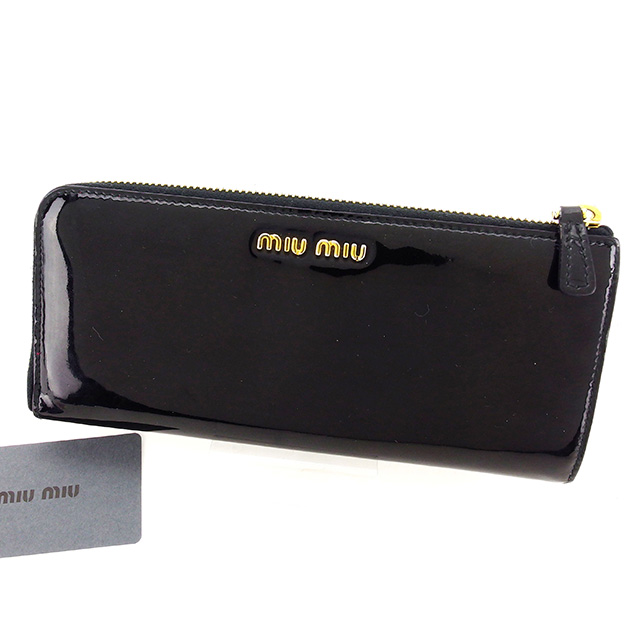 ■管理番号：T2984 ◆参考価格：円 【商品説明】 ミュウミュウ【miu miu】の 長財布です。 レディライクなリボンモチーフ付き&star;L字ファスナー式で大きく開くのでお金の出し入れ