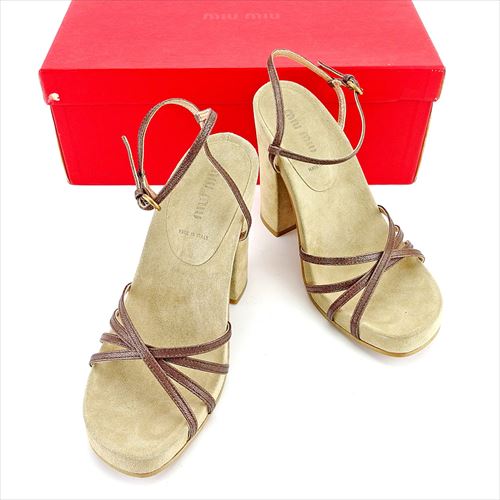 ■管理番号：T5547 ◆参考価格：円 【商品説明】 ミュウミュウ【miu miu】の 「36ハーフサイズ」 サンダルです。 足元がキレイに見えるクロスデザイン&star;レトロ感のあるチャン